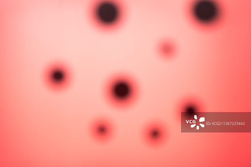 特克斯勒消逝效应红色抽象背景，印度西孟加拉邦加尔各答图片素材