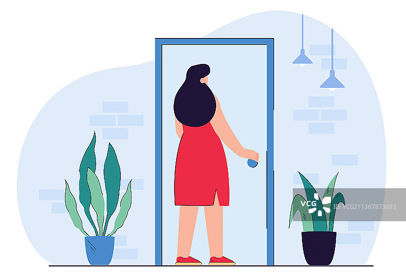 握着门把手准备进入的年轻女子图片素材