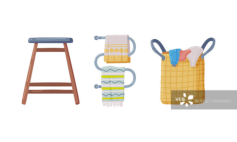 挂在架子上的毛巾和洗衣篮图片素材