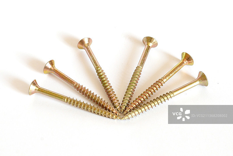 白色背景上的金色螺丝图片素材