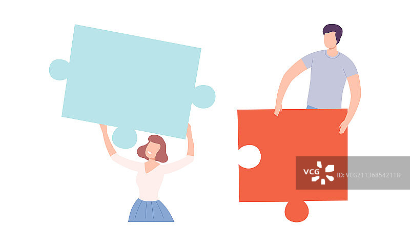 年轻男女拿着巨大的拼图图片素材