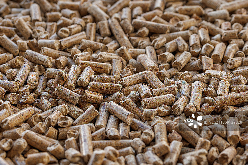 压实的木屑颗粒，宠物和生物燃料的垫料，已满图片素材