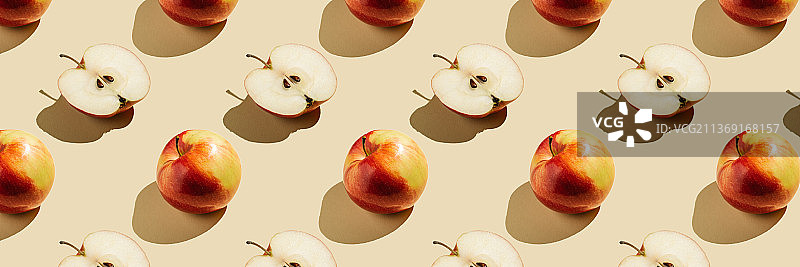 米色背景上的苹果图案图片素材