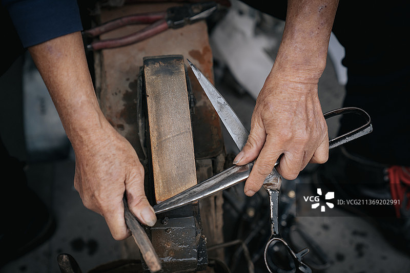 传统手工艺磨剪刀图片素材