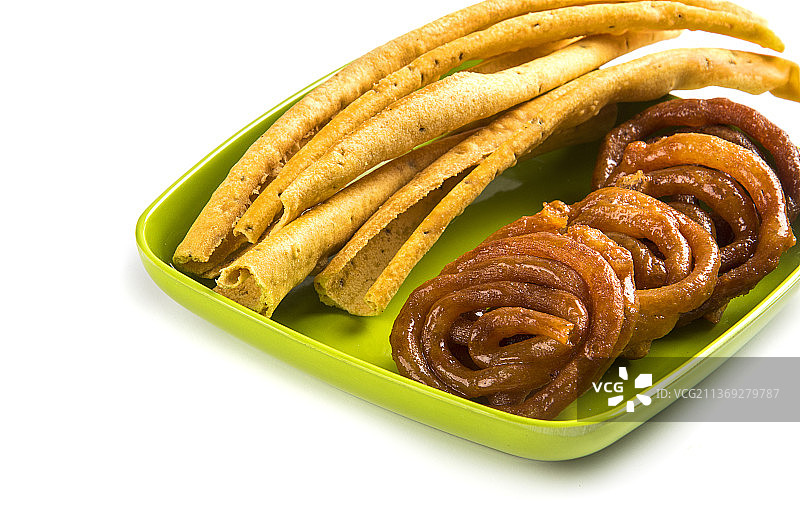 印度美食：古吉拉特邦特色小吃法夫达和杰雷比图片素材