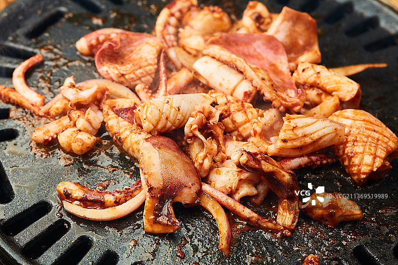 炭烤海鲜烤鱿鱼图片素材