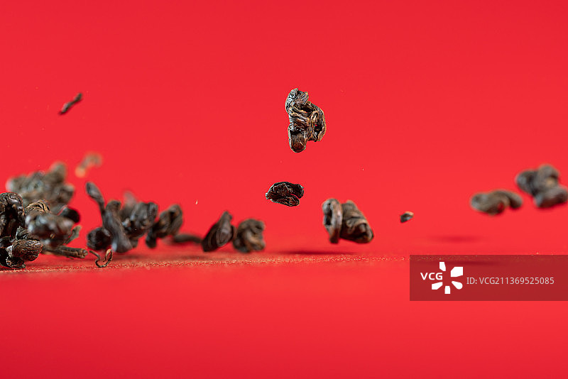 红色背景跳动的云南滇红红茶碧螺广告素材图片素材