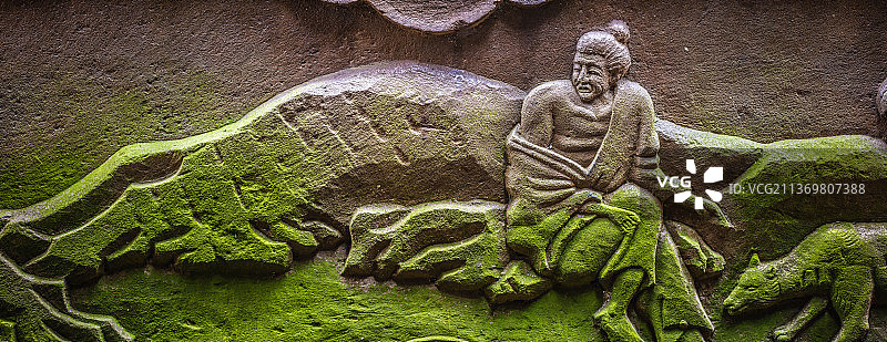 石壁上的雕刻画图片素材