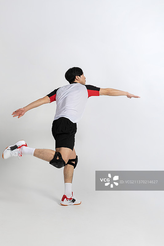 排球运动员：亚洲韩国男子扣球进攻图片素材