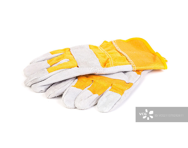黄白色建筑手套，白色背景下的彩色手套特写，摩尔多瓦图片素材