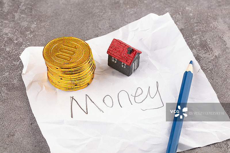 准备买房子的钱款金币图片素材