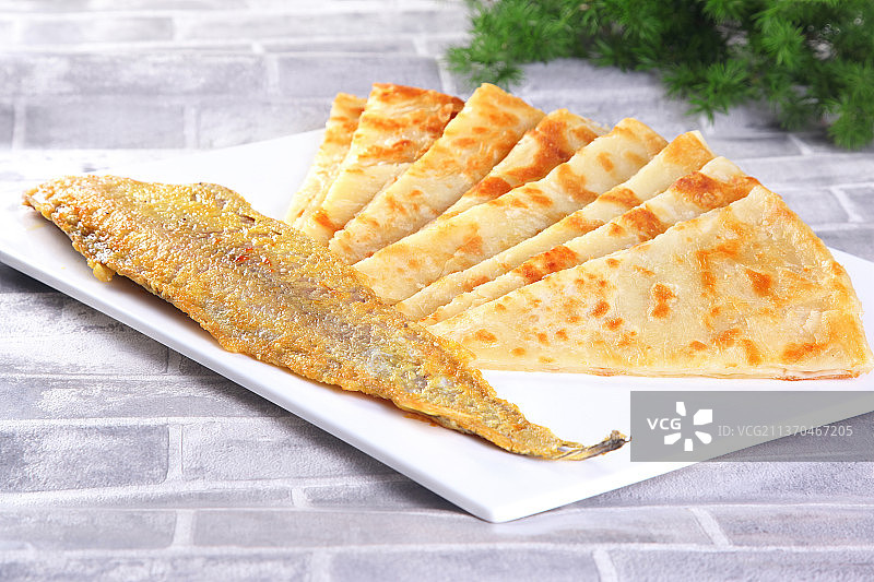 中餐美食-咸鱼饼子图片素材