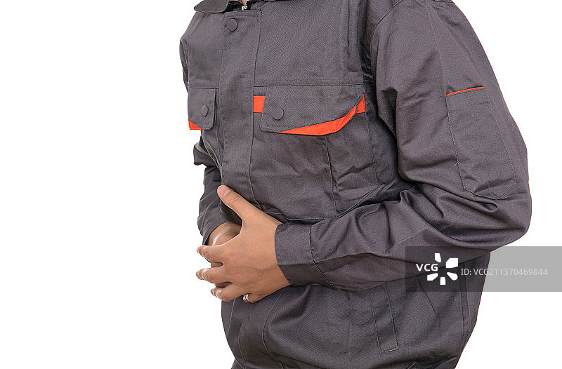 肚子疼痛的工人手捂着肚子图片素材