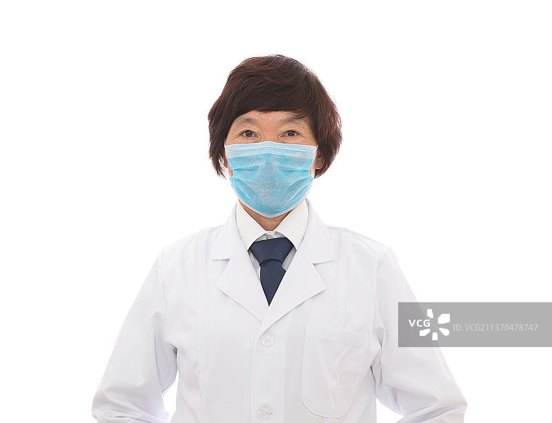 白背景前戴着口罩的女医生图片素材