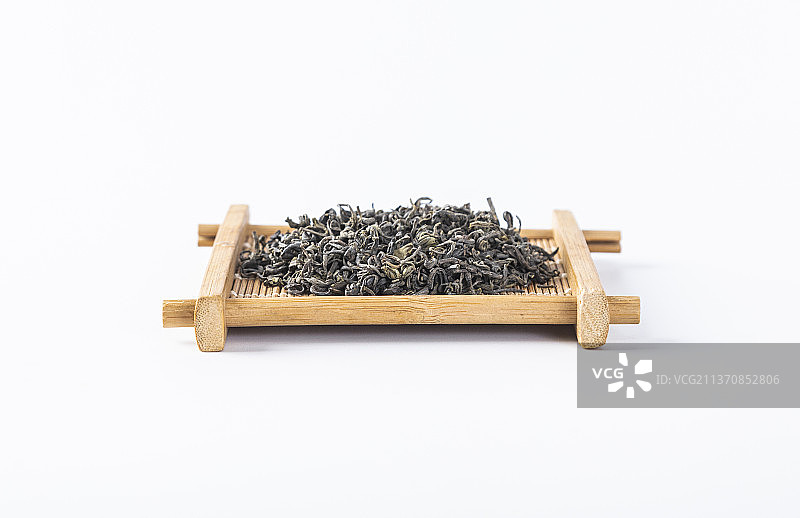 白底上放着的茶叶和茶具图片素材