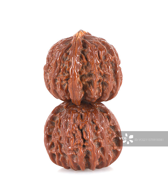 白背景上一对文玩核桃图片素材