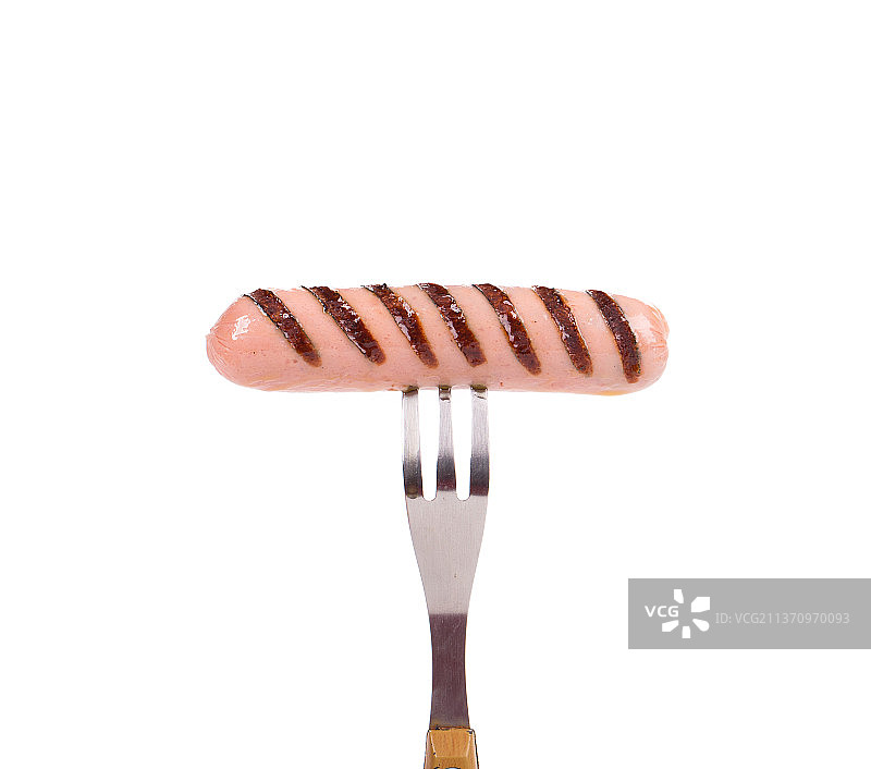 叉子上的烤香肠，白色背景上的蜂蜜勺特写，摩尔多瓦图片素材