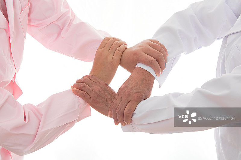 医生和护士两只手抓叠在一起图片素材