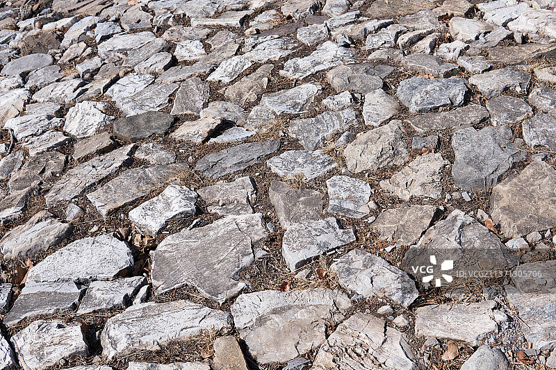 石头铺成的斜面陡坡背景图片素材