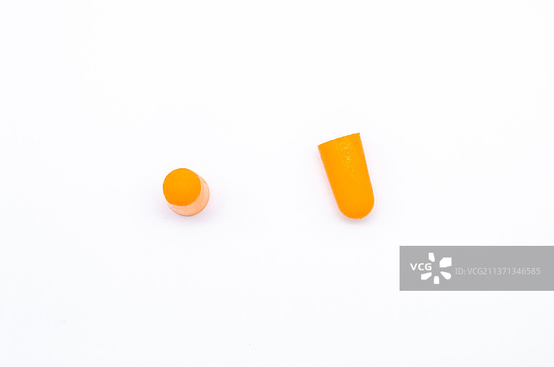 亚洲中国家庭用品拍摄主题，内室内影棚拍摄静物图像，一对黄色的防噪耳塞，室内无人图像摄影图片素材