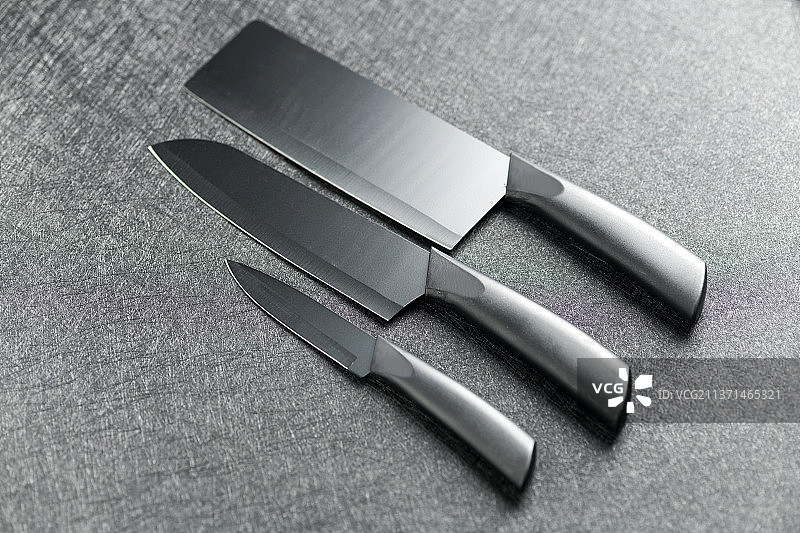 厨刀菜刀水果刀特写黑色背景图片素材