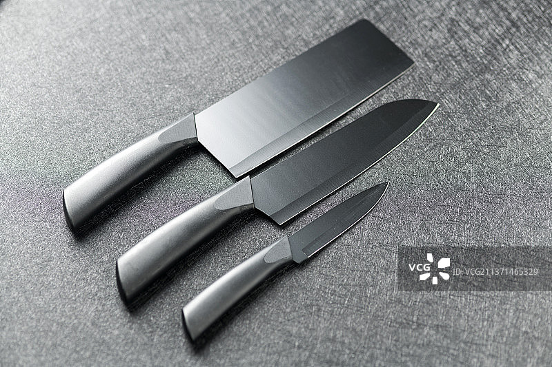 厨刀菜刀水果刀特写黑色背景图片素材