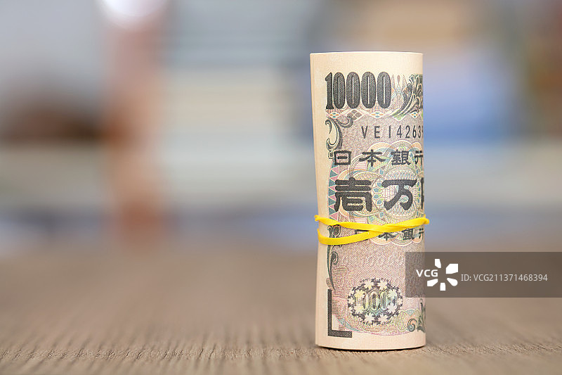 一卷日元纸币特写图片素材