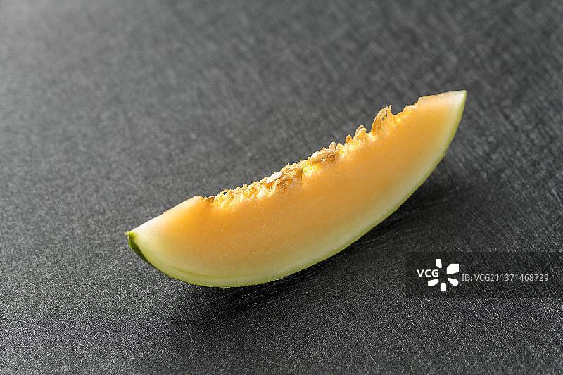 新疆特产哈密瓜特写黑色背景图片素材