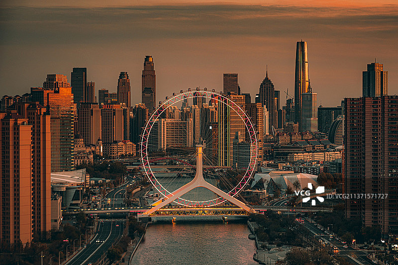 天津之眼摩天轮城市壁纸背景都市现代广告传媒风光风景高视角航拍旅行户外黄昏建筑图片素材