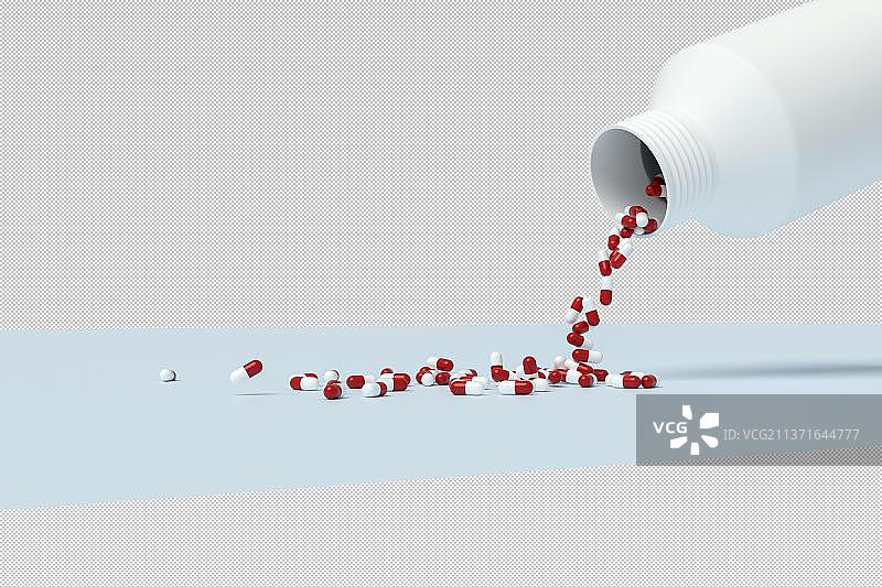 药丸从瓶子里从倒出图片素材