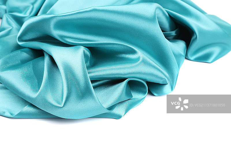 浅蓝色丝绸的柔和褶皱和高光图片素材
