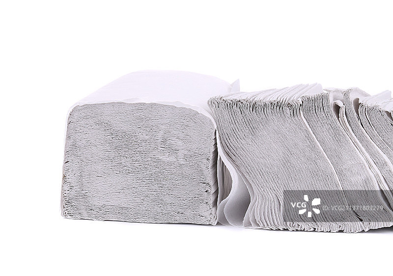 堆叠的一次性纸张，白色背景下的折叠毛巾特写，摩尔多瓦图片素材