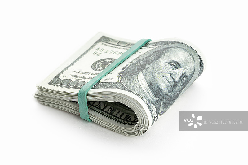 用松紧带捆扎的对折的钱堆图片素材