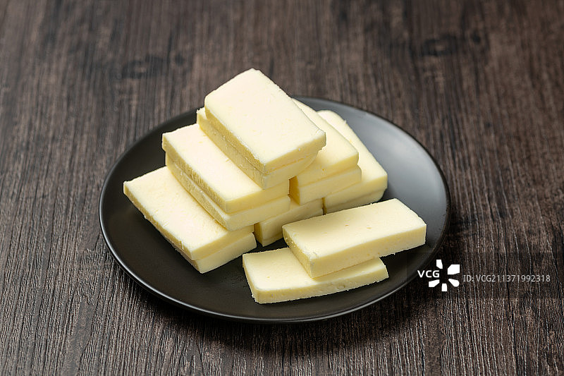 奶豆腐特写木桌面背景图片素材