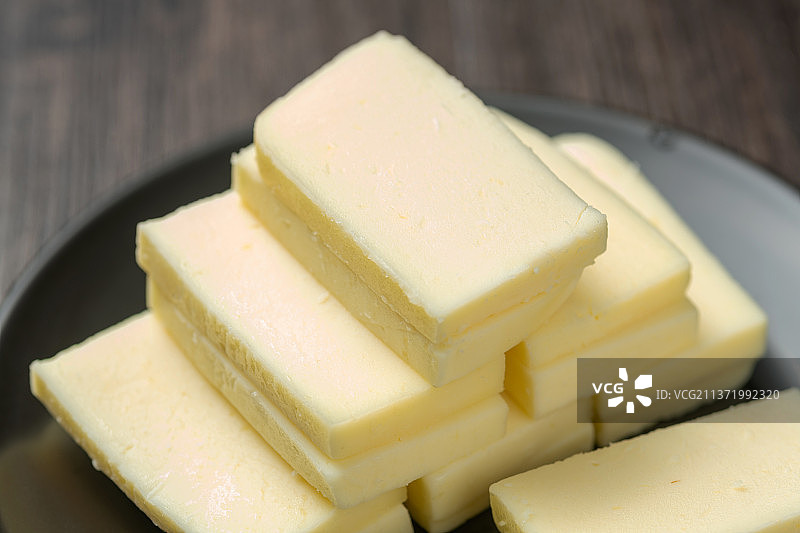 奶豆腐特写木桌面背景图片素材