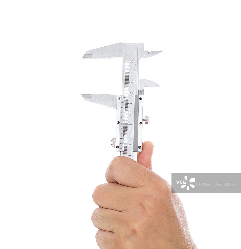 手拿卡尺在白背景前图片素材