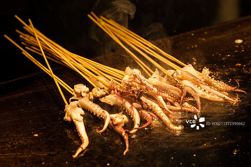 夜市美食铁板鱿鱼图片素材
