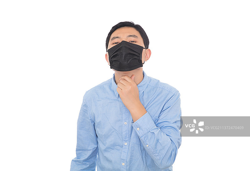 戴着口罩嗓子疼痛的男士图片素材