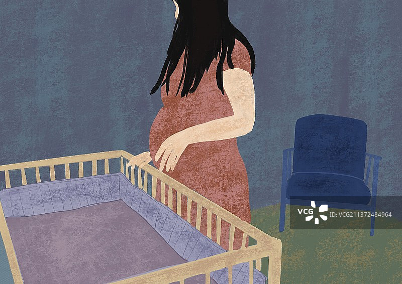 婴儿床边的母亲图片素材