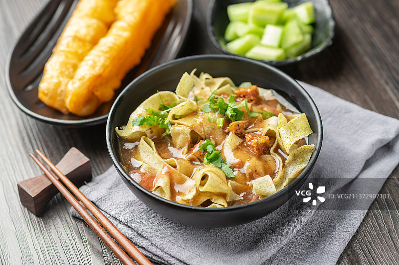 天津传统早餐锅巴菜特写图片素材