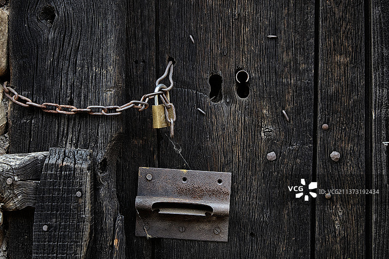 西班牙圣法昆多老旧木门特写图片素材
