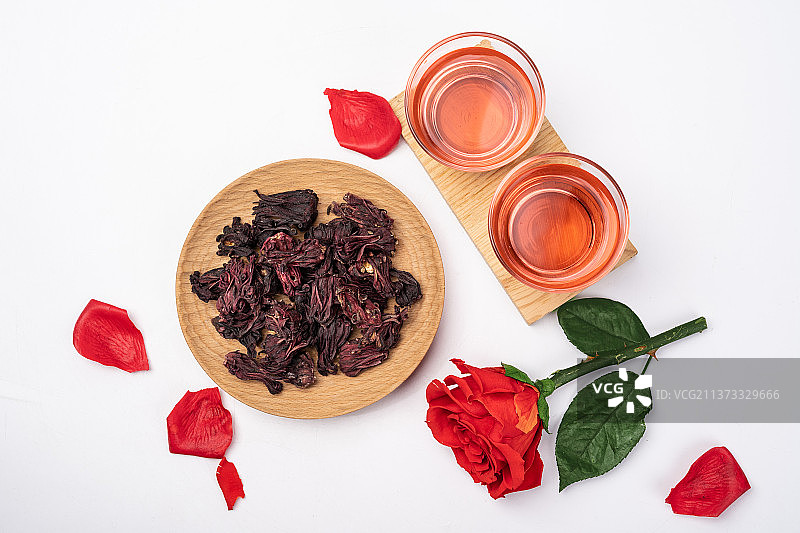 中式传统女士美容养颜玫瑰茄茶花草茶图片素材