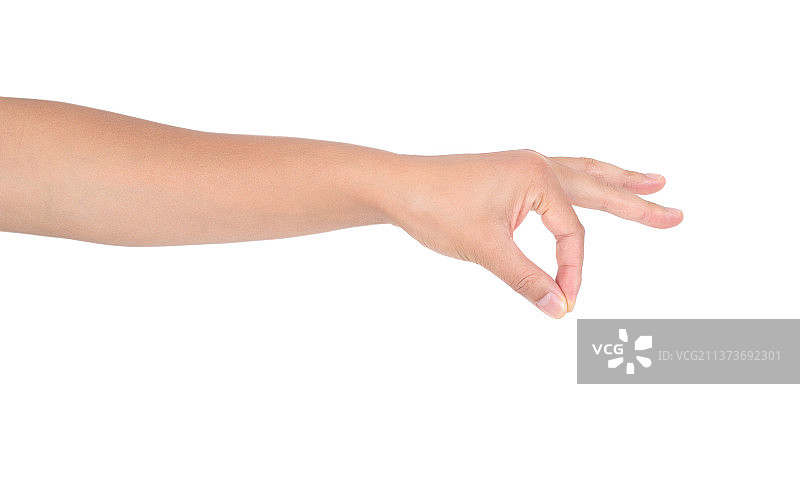 白背景前一只捏东西状态的手图片素材