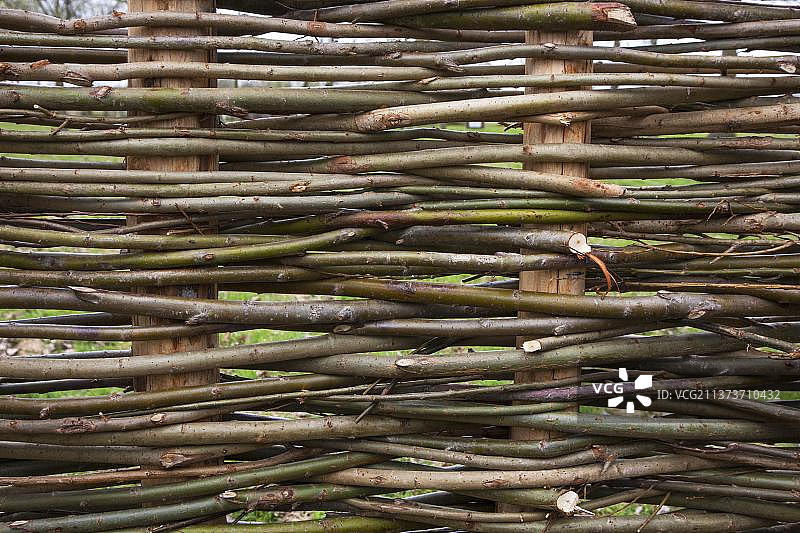 用细柳枝编织的传统篱笆图片素材