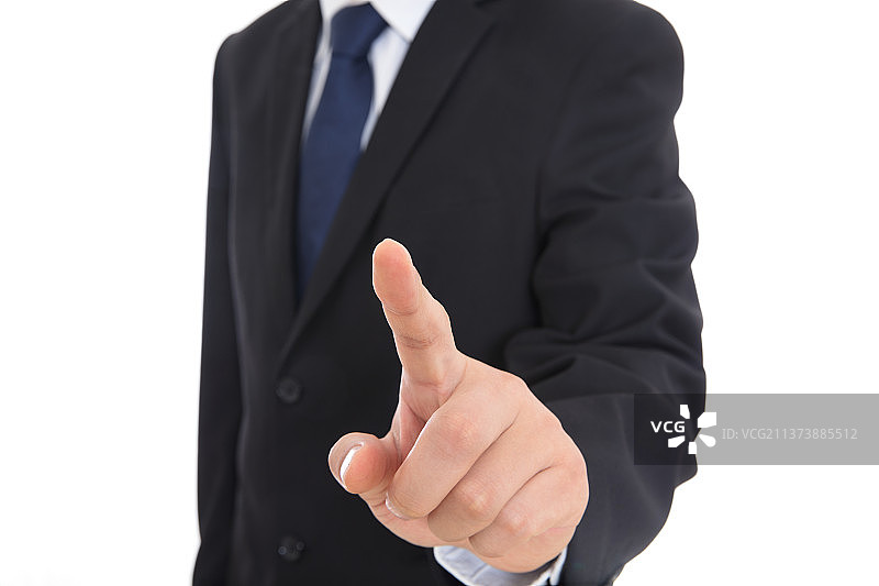 穿着黑色西装的男士伸出食指做点击的手势图片素材