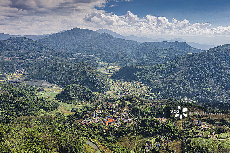 航拍芒市孔雀谷下山脉晴天风光地形图图片素材