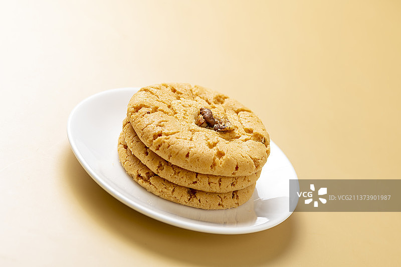 核桃酥特写黄绿色莫兰迪色系背景图片素材