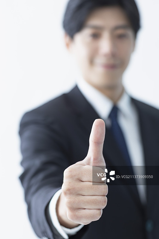 商业男性正在作赞的手势图片素材