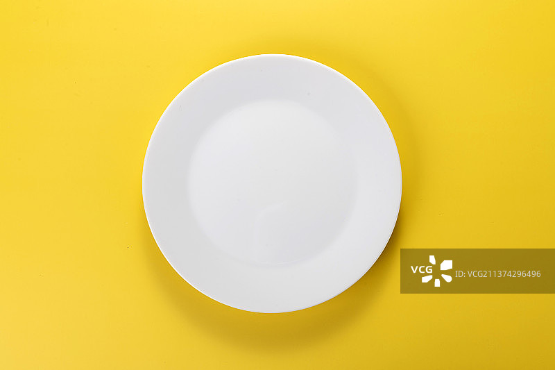 白色盘子特写光盘行动概念图片素材