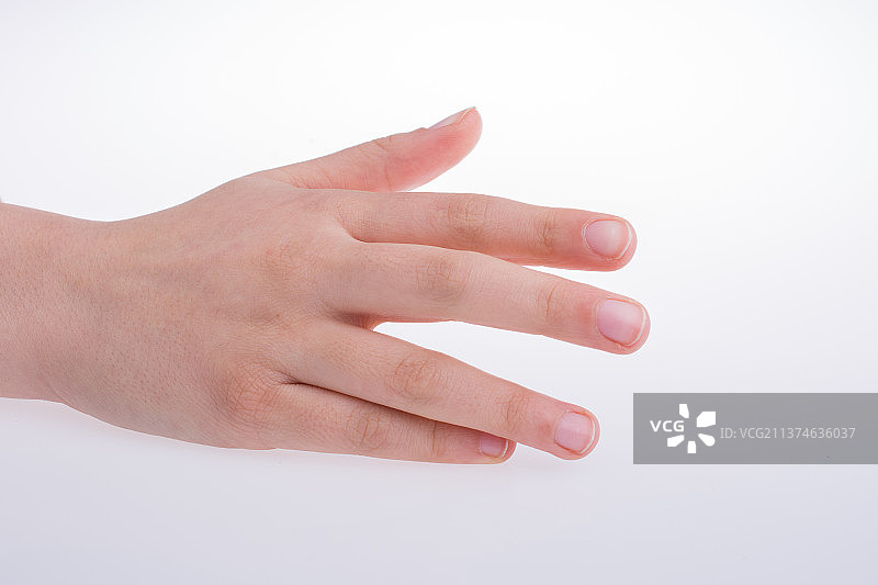 手部张开的姿势，白色背景上的人手特写图片素材